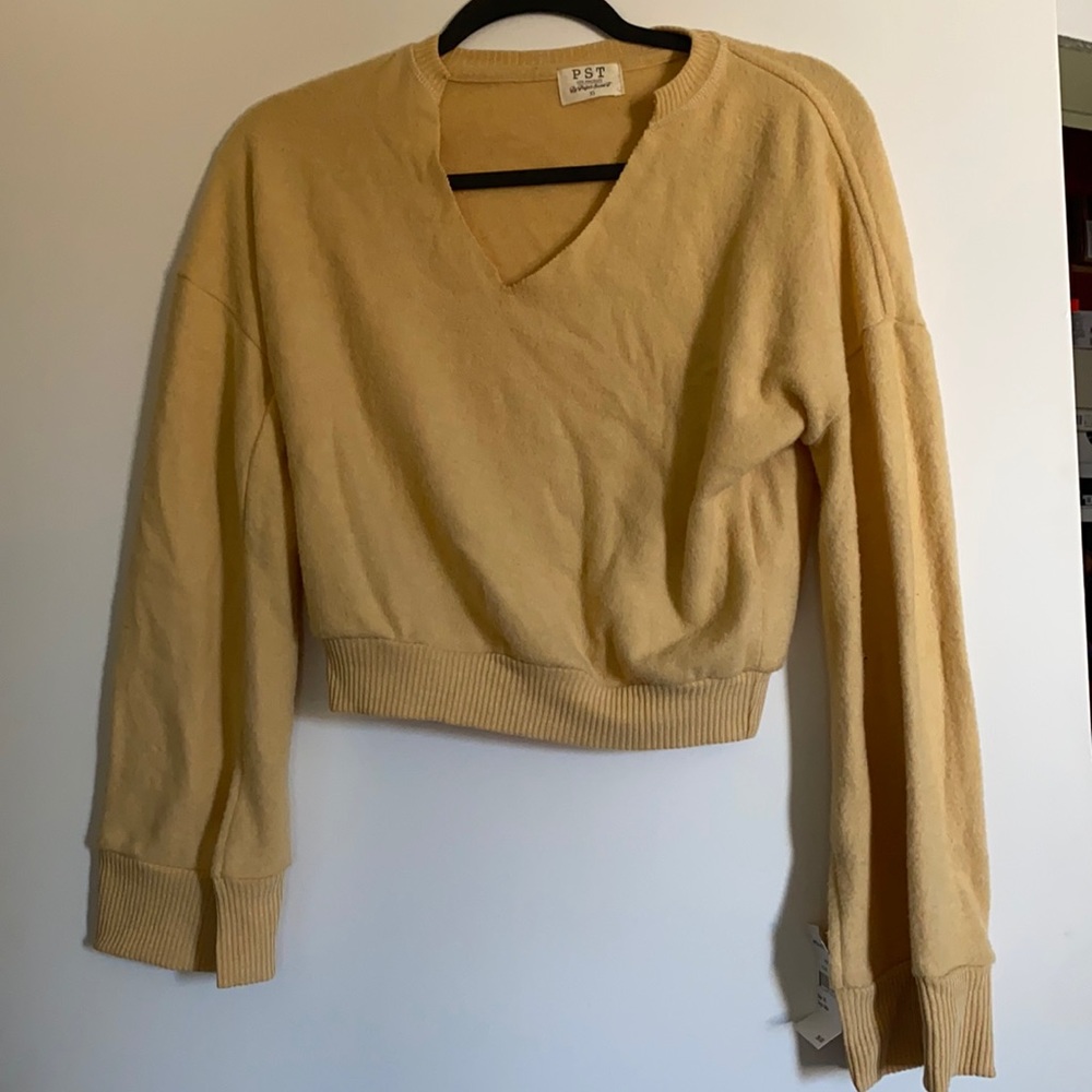 Selling a soft/pastel yellow sweater crop top. Nordstrom never worn with tags.